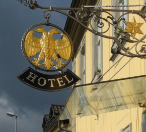 Гостиница Hotel Goldener Adler Garni  Халльштадт